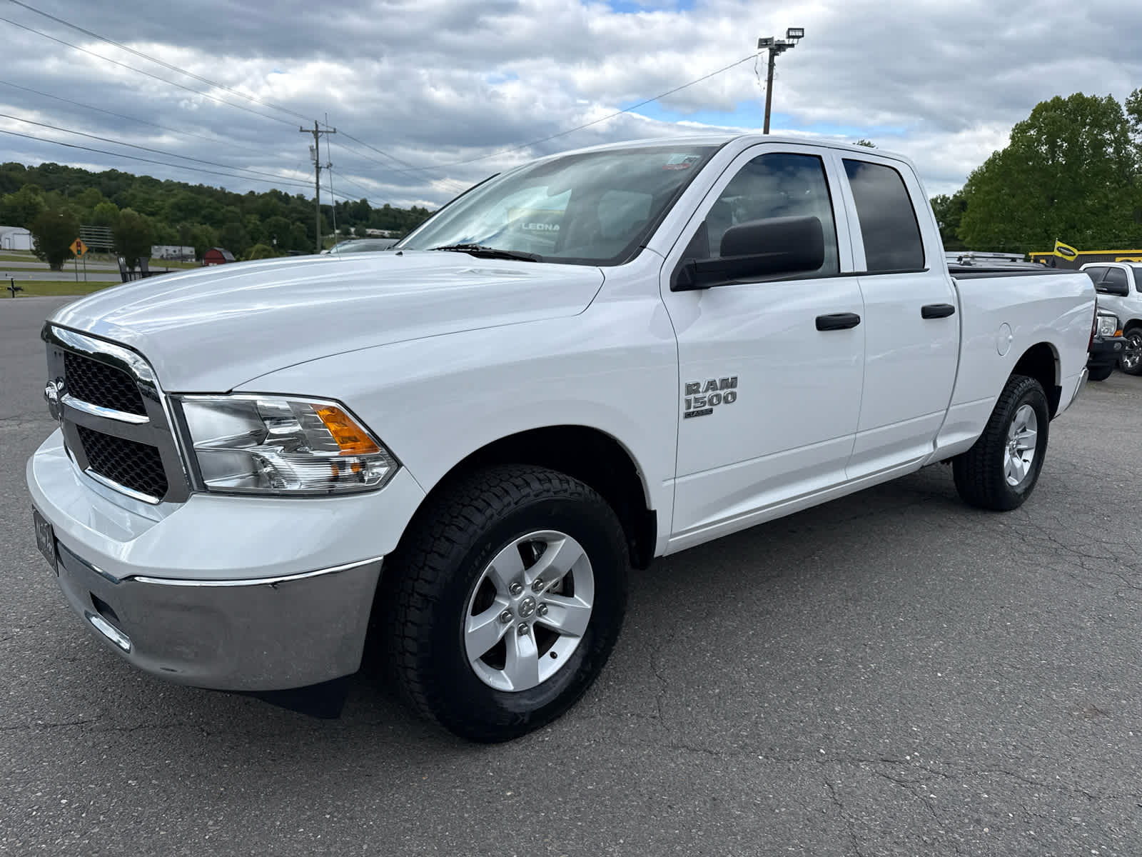 2024 RAM 1500 Classic SLT Quad Cab 4x4 6'4' Box